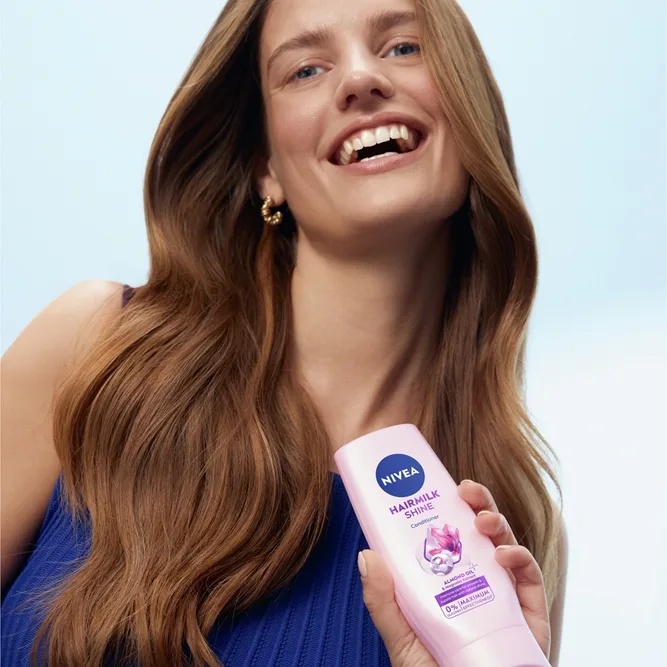 NIVEA Hairmilk Natural Shine hoitava hoitoaine 200 ml