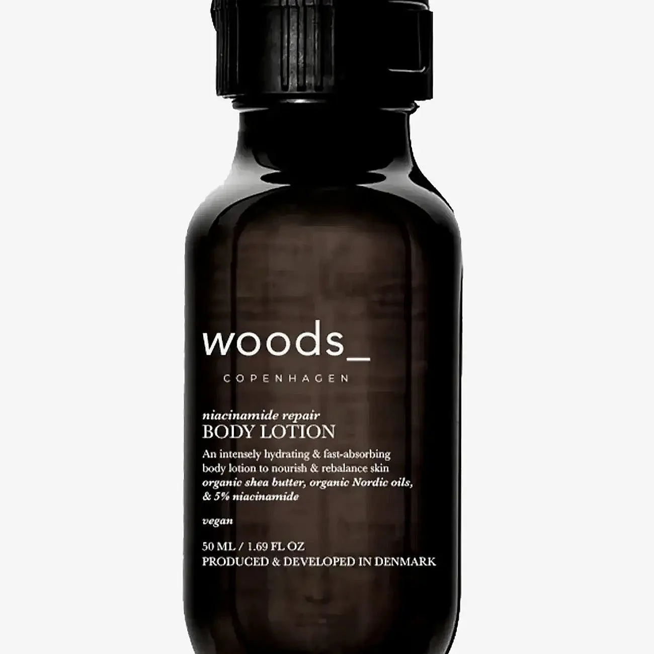 woods_ copenhagen Niacinamide Repair Body Lotion - Black - 50 ML